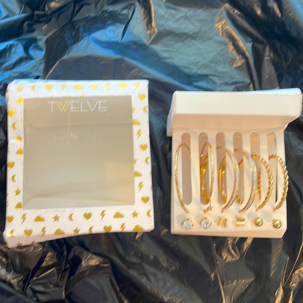 Boxed set of earrings gold tone/silver tone. Nib.